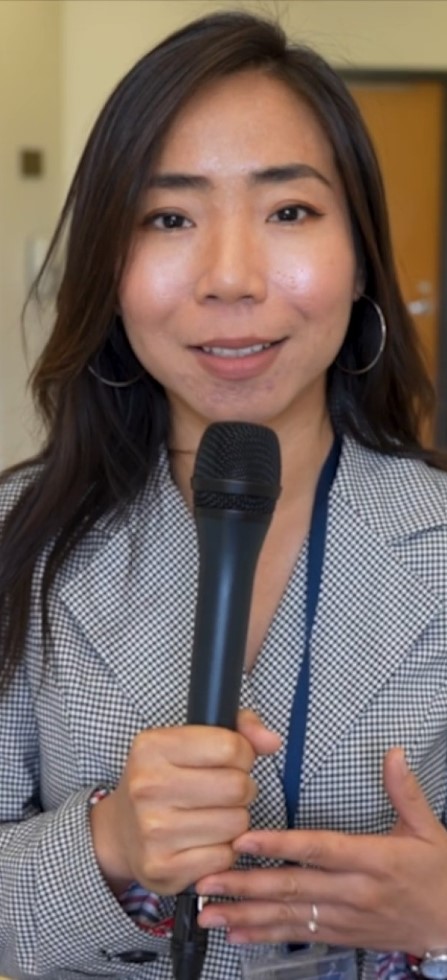 Teacher holding microphone